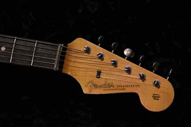 Crossroads Fender closeup of head and tuning keys Crossroads Fender closeup of head and tuning keys