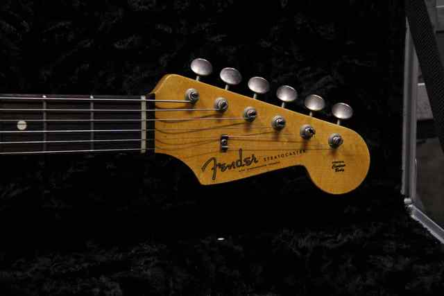 Crossroads Fender closeup of head and tuning keys Crossroads Fender closeup of head and tuning keys