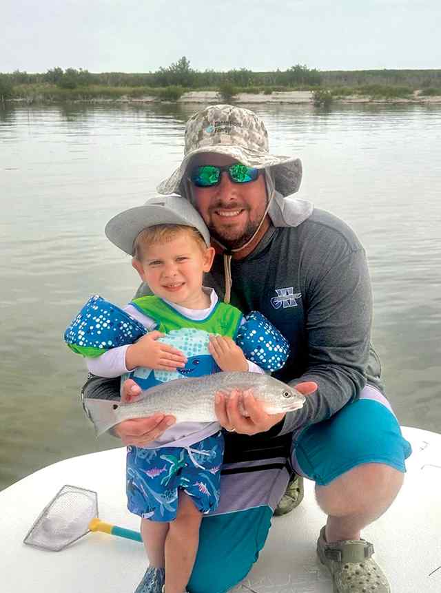 Joseph "Boomer" & son, Easton Anderson first fish for Easton!