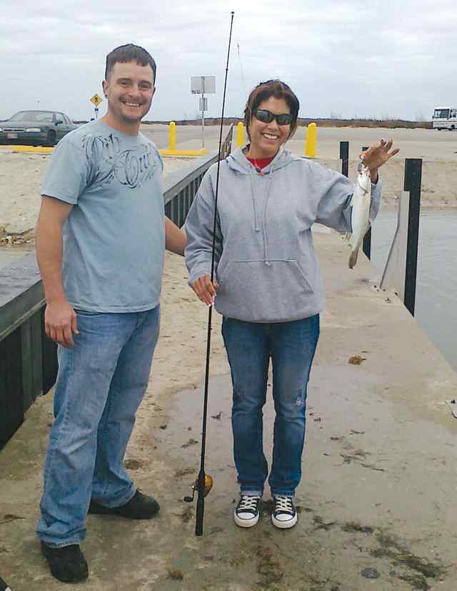 Jennifer & Duane Port AransasJennifer's first fish ever!