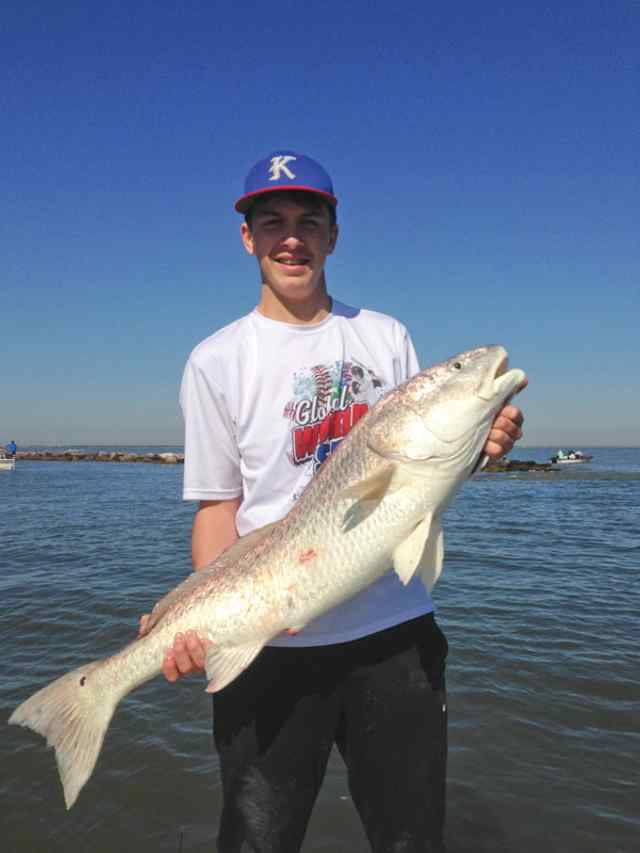 Chris Foster Galveston Bay, North Jetty36&quot; 20 lb first bull red!