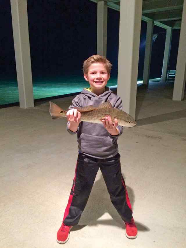 Cayleb Burgin Galveston West Bay - 20" first slot red! Caught off the dock.