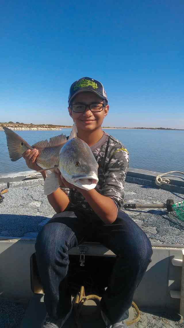 Ryan Cruz Palacios Bay - 27" first redfish & first time bay fishing!