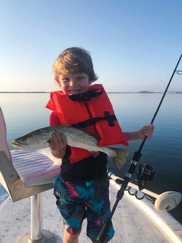 Jaxon Cuellar Corpus Christi - 19" first trout! Caught in night hawk