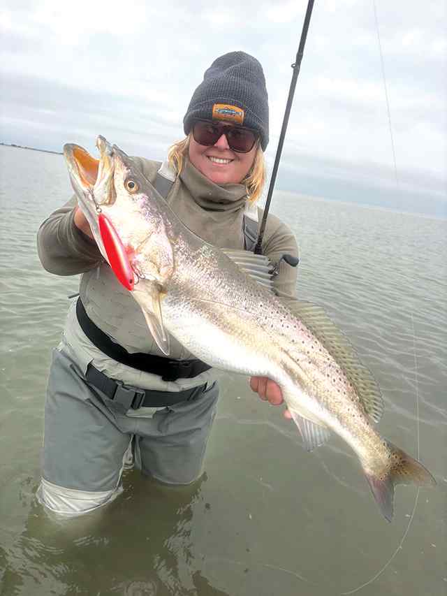 Brittany Gale Port Mansfield - 30" 9 lb trout, caught on an orange skitterwalk