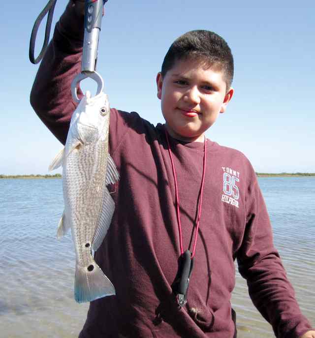 Miguel Achoy Aransas Passfirst redfish!