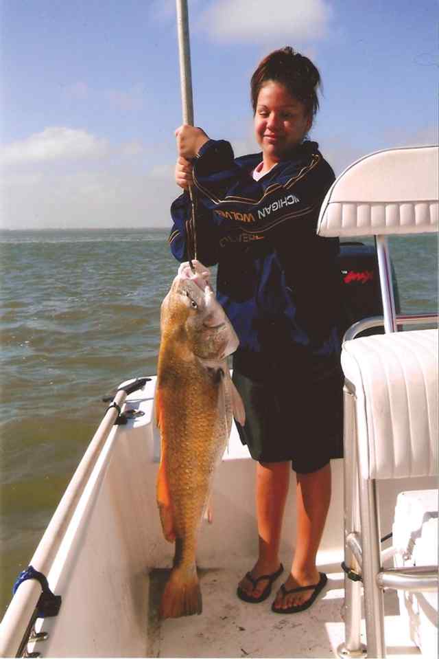 April Flores Padre Island40&quot; drum, first fish!