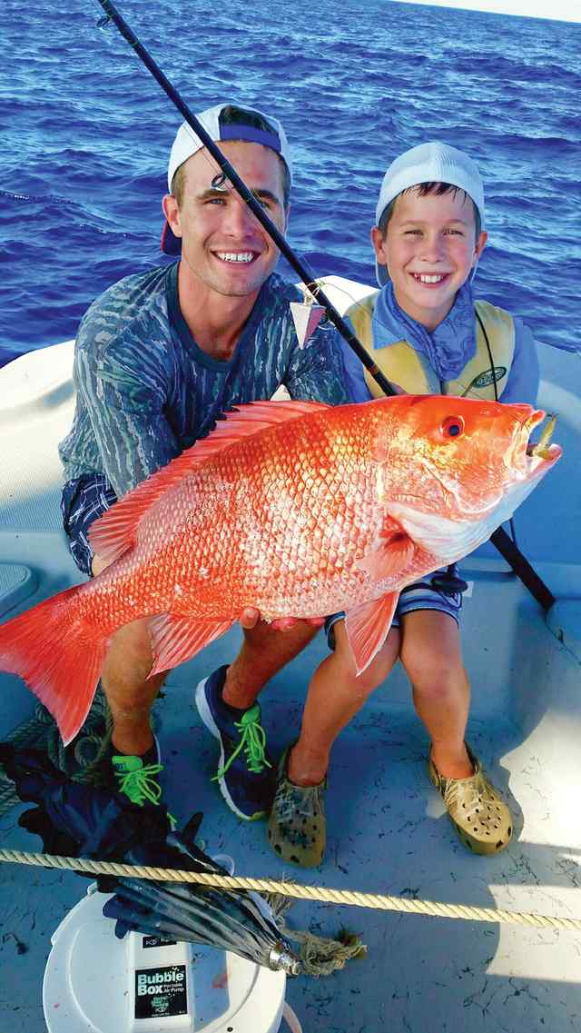 Austin & Nicolas Jackson 16 miles off South Padre, at a cluster of oil rigs - red snapper