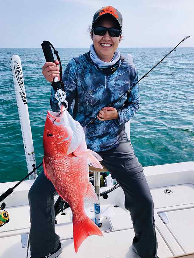 Lyann Garza Port Mansfield, first fishing trip offshore - 15 lb first red snapper! 