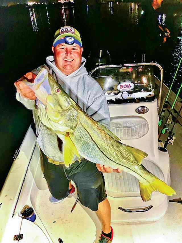 Cory McFall South Padre - snook, caught over 40 snook in all, the biggest was over 35 inches, estimated 17-20 lbs; caught on soft plastic and topwater