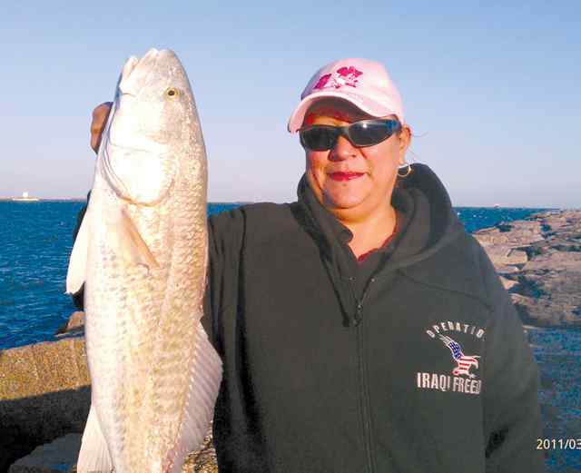 Gloria Robinson Port Aransas jetties28&quot; first red!