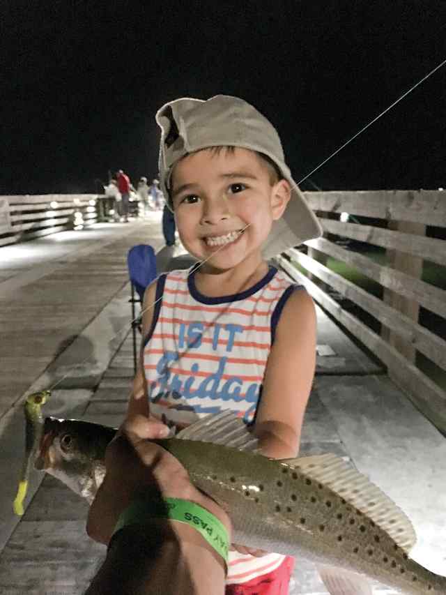 Carlos Adrian Cienfuegos Jr Galveston - 18" trout, caught on chicken of the sea