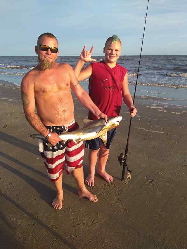 John Burchett III with dad (John Burchett II) Holly Beach - shark