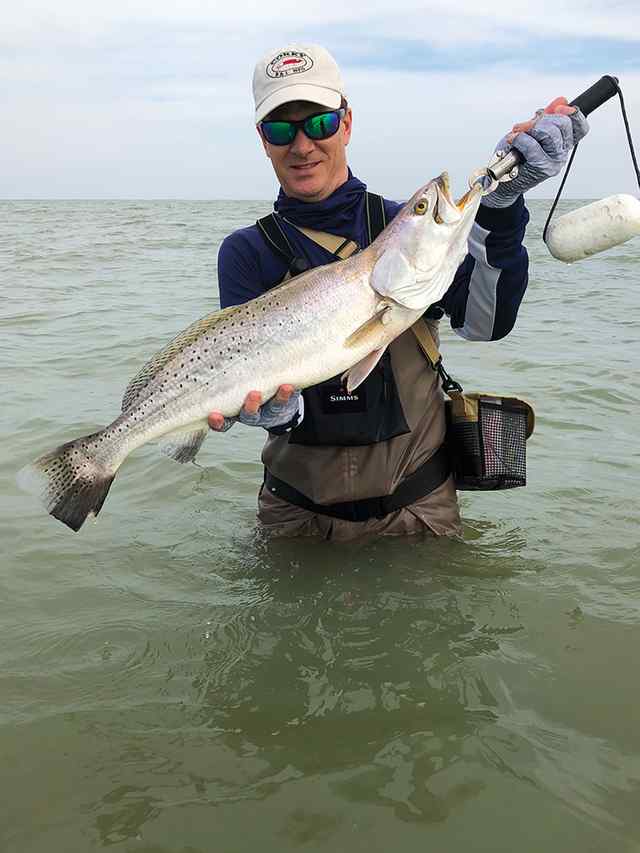 Mark Hooker Baffin Bay - 28" 8 lb trout, caught on a red shad Texas Trout Killer