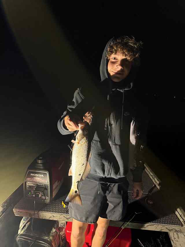 Levi Elliott Jones Bay - 13.5" first redfish!