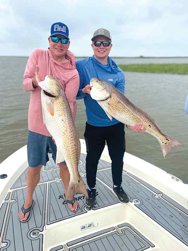 Bill Falconer & son, Liam redfish