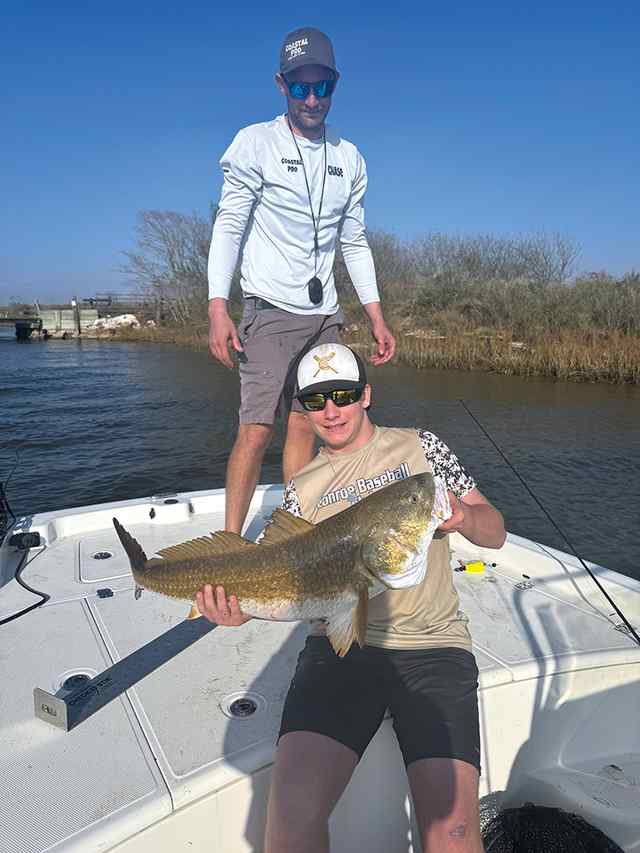 Chase Kubeczka & son, Gunner Galveston (East Bay) - 36.76" redfish, caught on popping cork and artificial shrimp