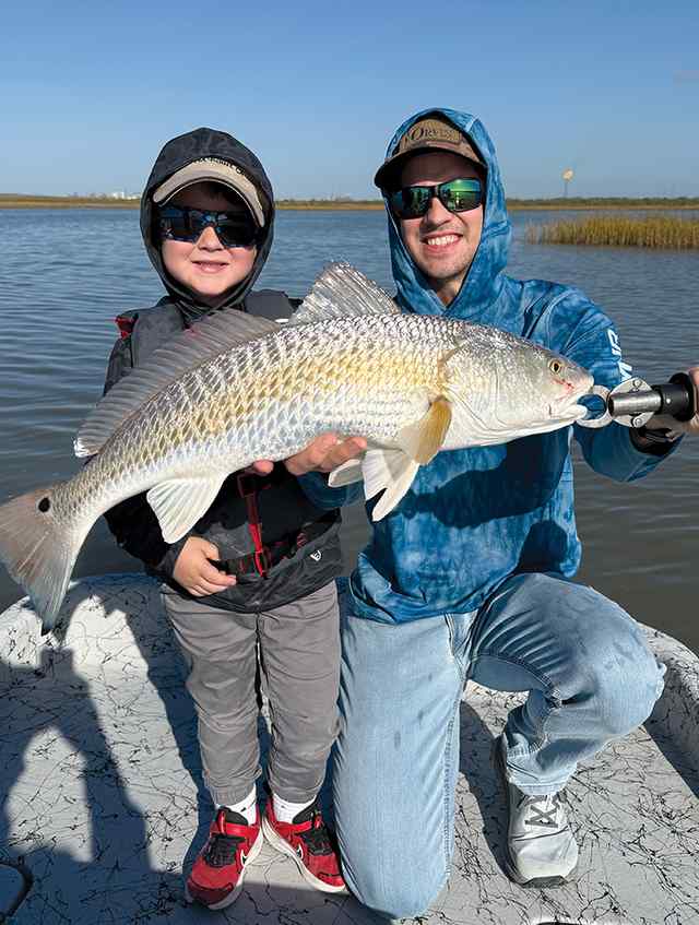Matt & son, Walker Cox Bay - 28" 9 lb redfish