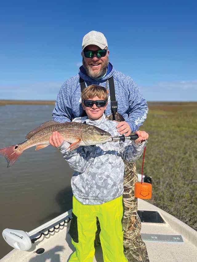 Adam Weller & son redfish