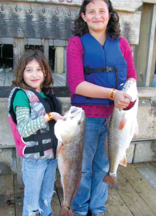 Paige Cantu & Alexis Cerda Aransas Bay
33” & 29” redfish