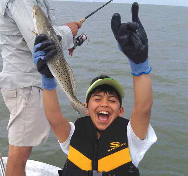 Zack first keeper trout!