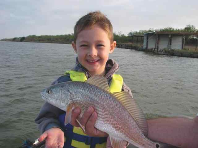 James Adamczyk Arroyo City18&quot; first redfish! CPR