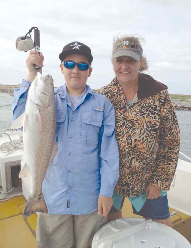 Tyler Thomas & Debbie Broussard Port O'Connorpersonal best red!