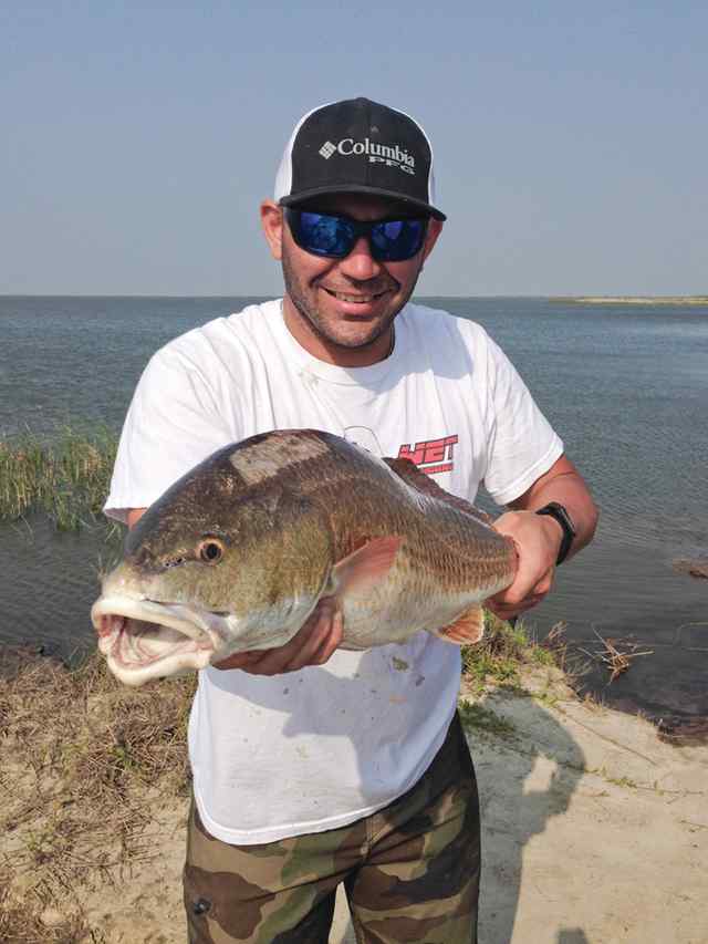 Adrian Salinas Trinity Bay28&quot; 9.5 lb redfish, big boy broke my G-Loomis.
