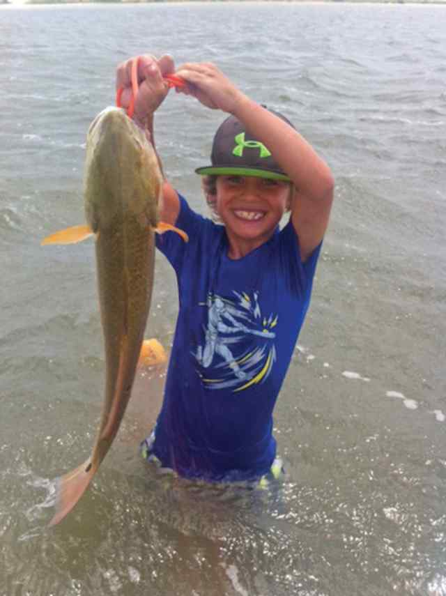 Gavin Garcia Corpus Christi27&quot; redfish, caught on a Kelly Wiggler rootbeer paddle tail