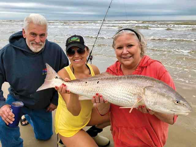 Ryan Becker, Allison Scheeler, & Lorilee Becker Padre Island National Seashore - 38" Mom's first red! CPR, caught from the shore