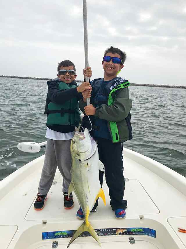 Eli & Ravi Boyareddigari POC jetties - jack crevalle CPR, caught while fishing with grandparents