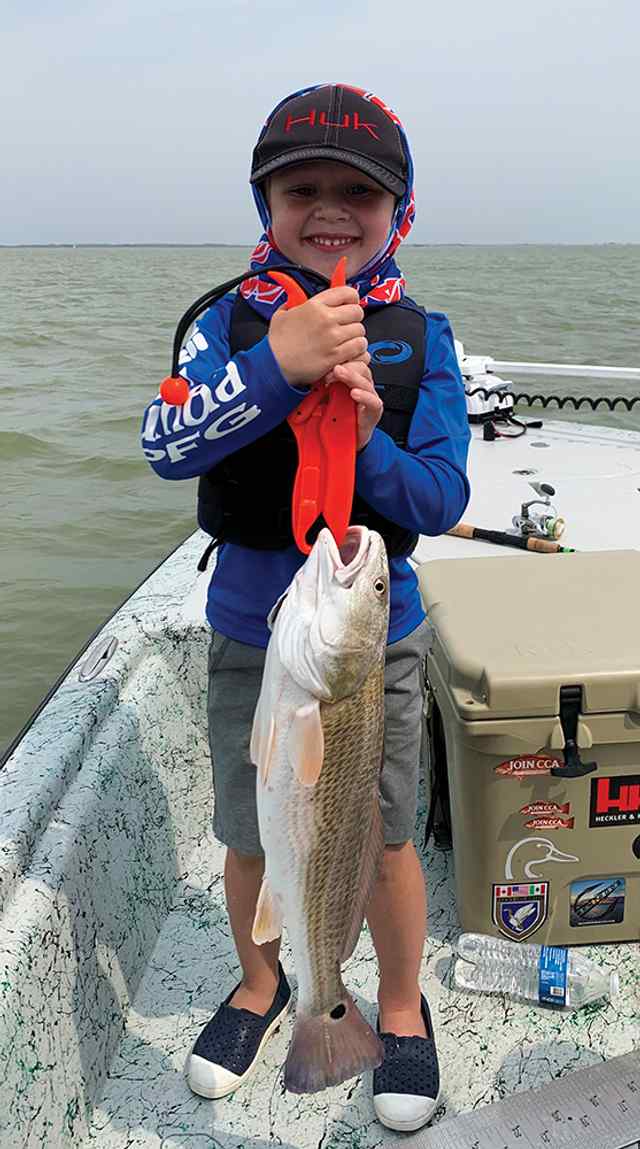 Kade Karlen Baffin Bay - 22" first redfish!