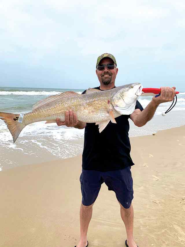Theron Korol Matagorda Beach - 33" redfish, caught surf fishing
