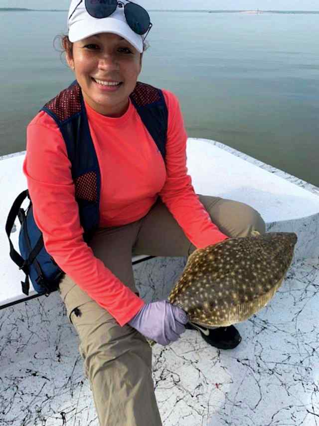Elena Perez Lower Laguna Madre - 22" first flounder! Caught on a white gulp
