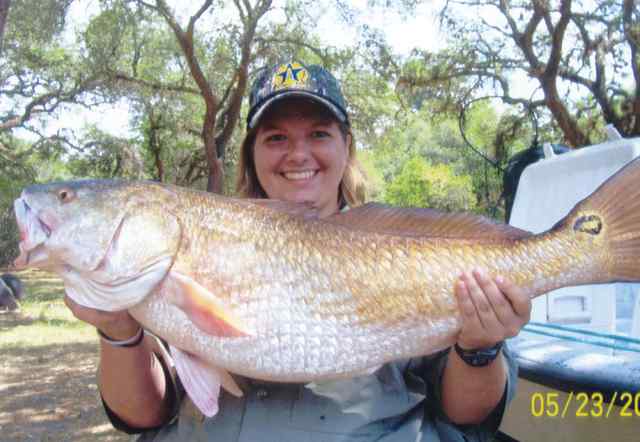 Flora Moore Lavaca Bay
37" 19lb bull red