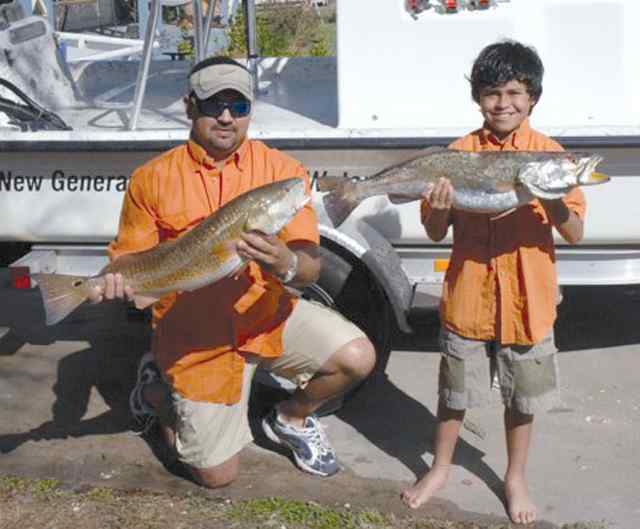 Augie & Derrick Hinojosa Baffin Bay29.5&quot; Derrick's biggest trout!