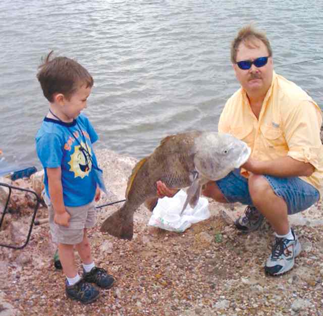 Kody Myers & Dad 36&quot; first black drum!
