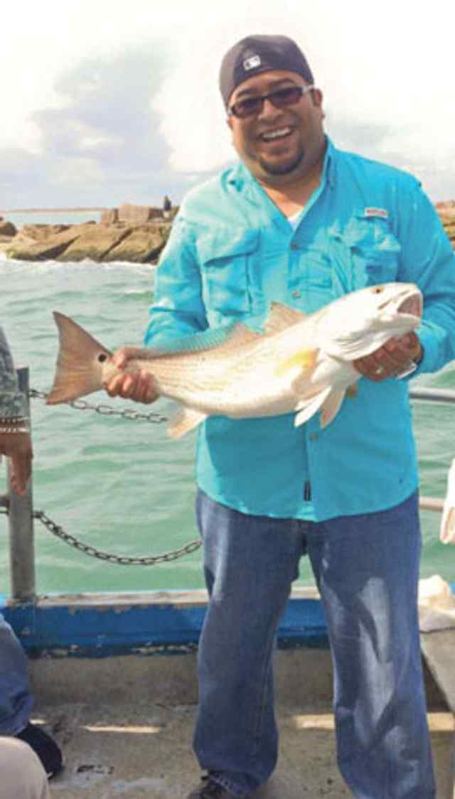 Juan Pacheco, Jr. SPI jetties32&quot; red drum, caught on his birthday!