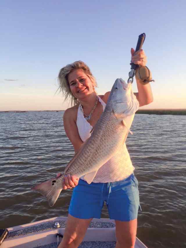 Kimberly Bozeman Matagorda - 31" redfish, caught on a Gulp shrimp on Mother's Day