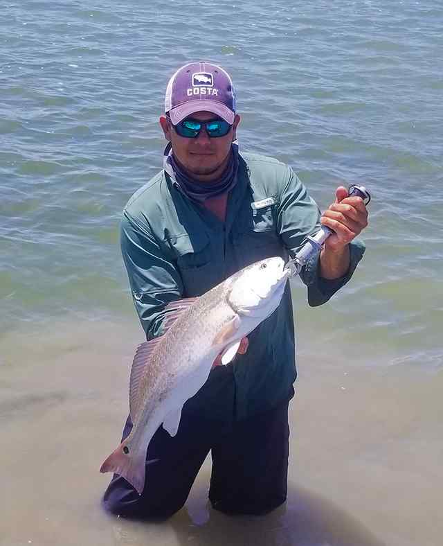 Joel Lozano Laguna Madre, wading near Arroyo - 27" 8.5 lb redfish