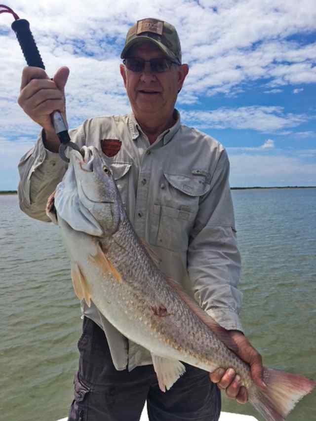 Larry Madsen Shoalwater Bay - 32" redfish CPR