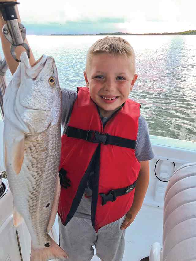 Cooper Pennington 27" first keeper redfish!