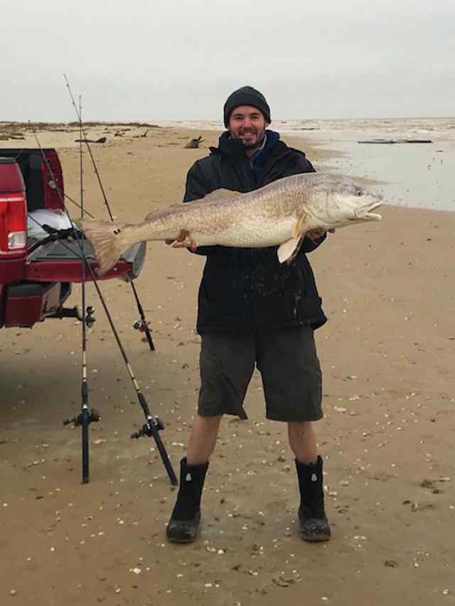 Roger Lightsey Sargent (in the surf near Mitchell's Cut) - 44" redfish CPR, caught on live mullet