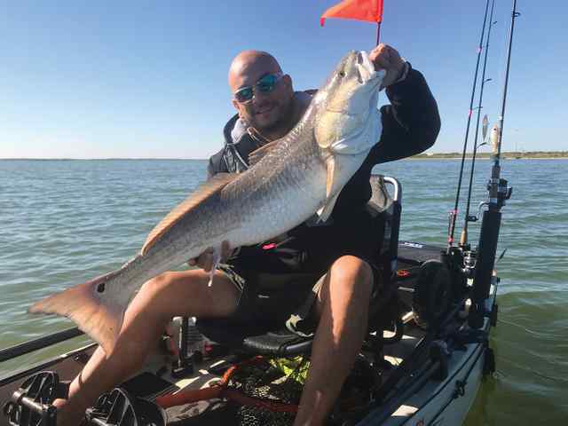 Bob Rivera Baffin Bay - 40+" redfish, caught on a red/white Gambler paddle tail
