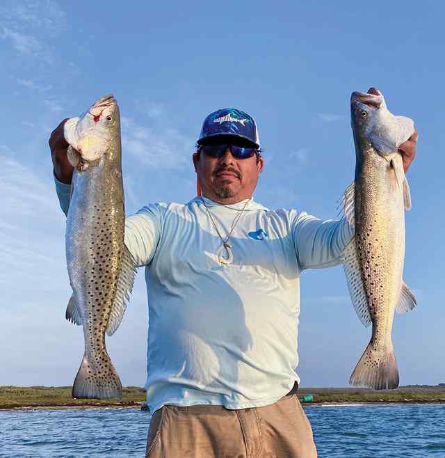 David Garcia Baffin Bay - 24" & 25" trout, caught on live croaker