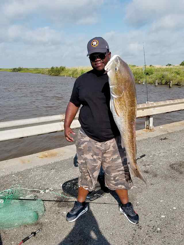 Donneville Prescott 33" 23.56 lb redfish, caught on a 6" croaker with 50 lb braid