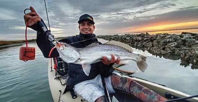 Jonathan Saldivar 26.5" 6.5 lb trout CPR, caught on Kwiggler ball tail shad