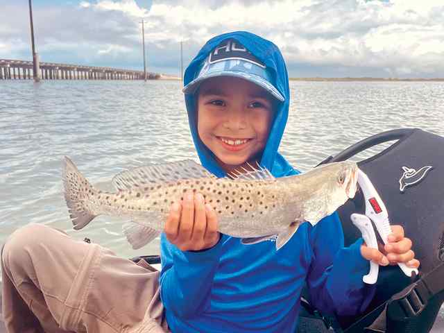 Aidan Aramburo Bayside - 17" trout, first kayak fishing trip!