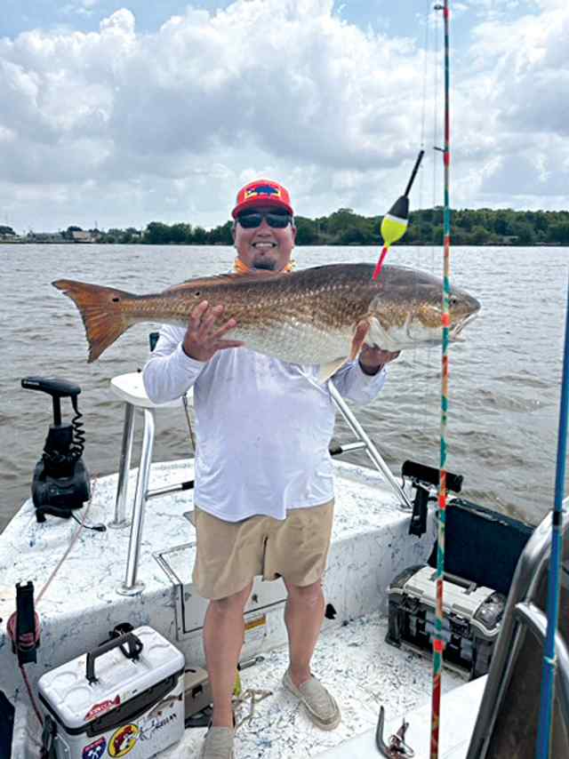 Rich Gonzales Port Arthur, Sabine Pass - 43" bull red, caught on a Purple Haze A.M.