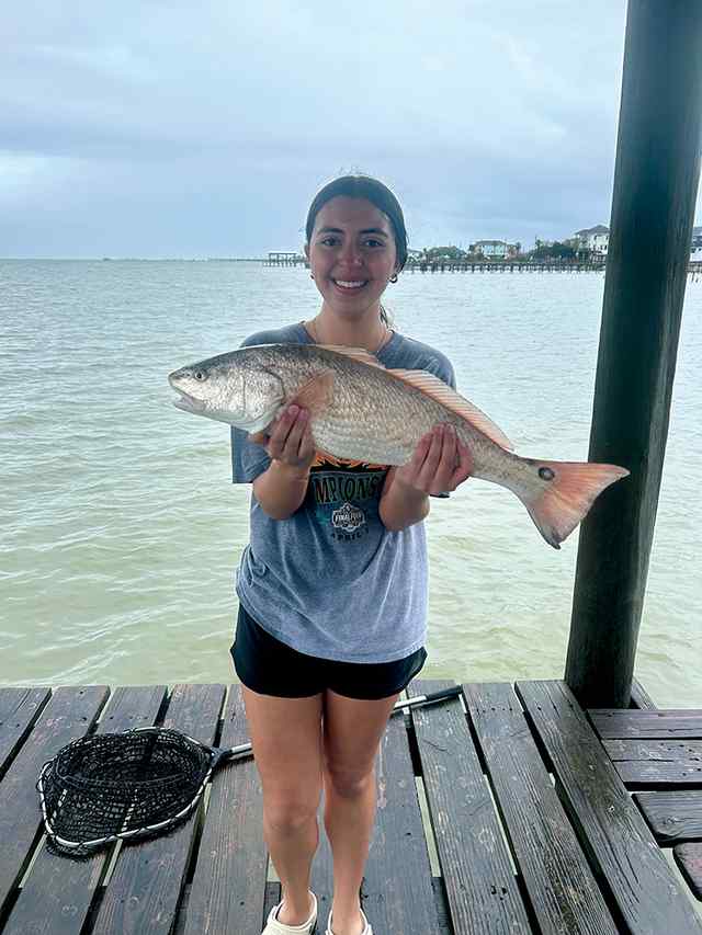 Jasmine Cavazos San Leon - first redfish!